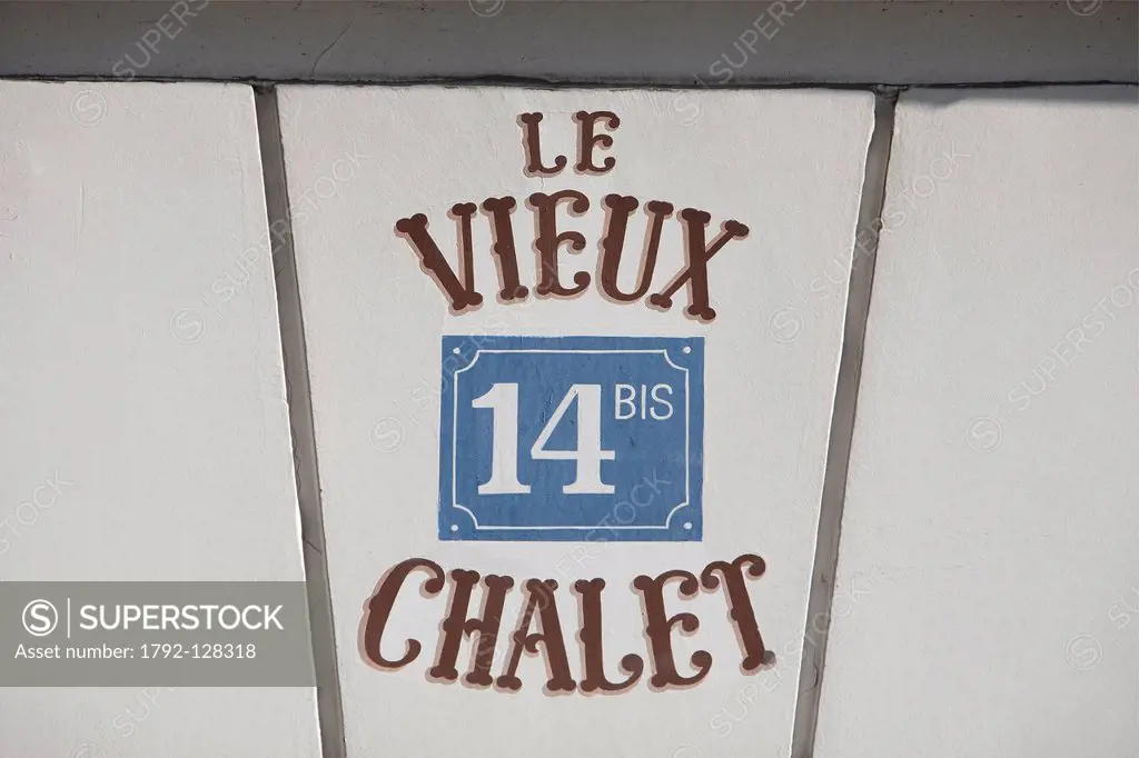 France, Paris, the Butte Montmartre, detail of the restaurant sign Le Vieux Chalet located on Norvins street