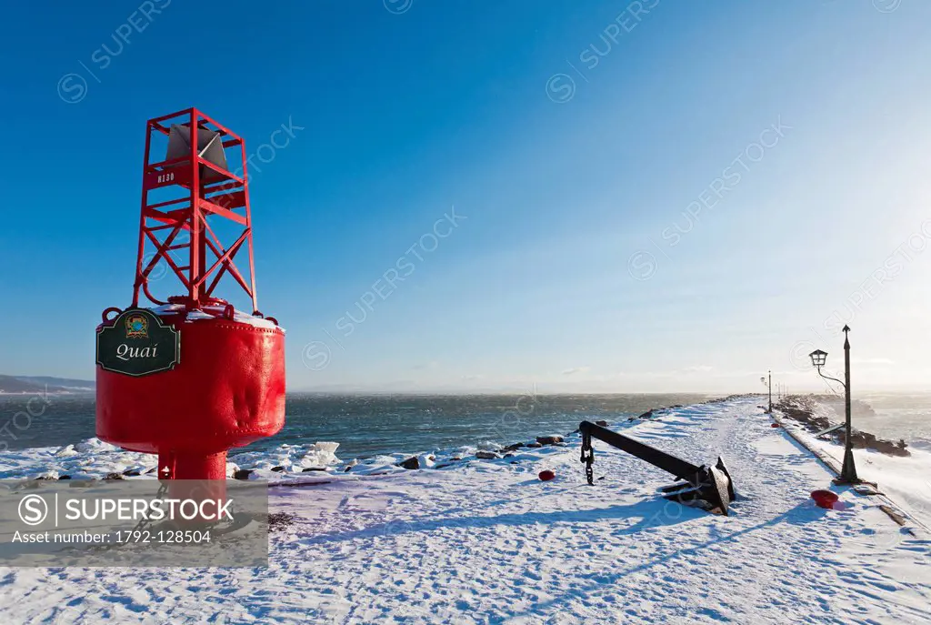 Canada, Quebec province, Charlevoix, St Irenee, the snowy pier, red buoy