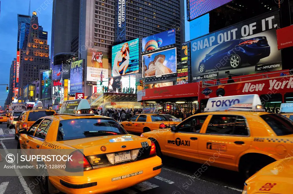 United States, New York City, Manhattan, Theater District on Broadway Avenue, yellow cab in Times Square