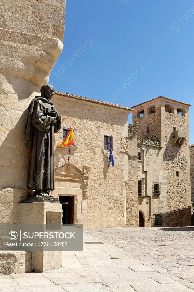 Spain, Extremadura, Caceres, old town listed as World Heritage by UNESCO, Golfines square, Bronze San Pedro de Alcantara patron of the diocese of Cace...