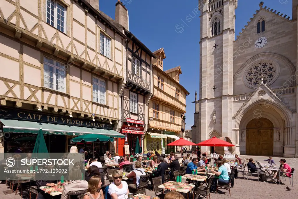 France, Saone et Loire, Chalon sur Saone, Place St Vincent timbered houses and cafe terraces in front of the St Vincent Cathedral