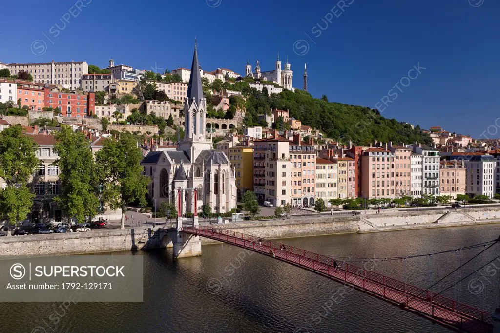 France, Rhone, Lyon, historical site listed as World Heritage by UNESCO, footbridge and St Georges Church over Saone River and Notre Dame de Fourviere...