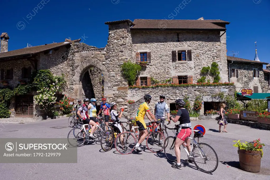France, Haute Savoie, Yvoire, Leman Lake, labelled Les Plus Beaux Villages de France the Most Beautiful Villages of France, cyclists on visit
