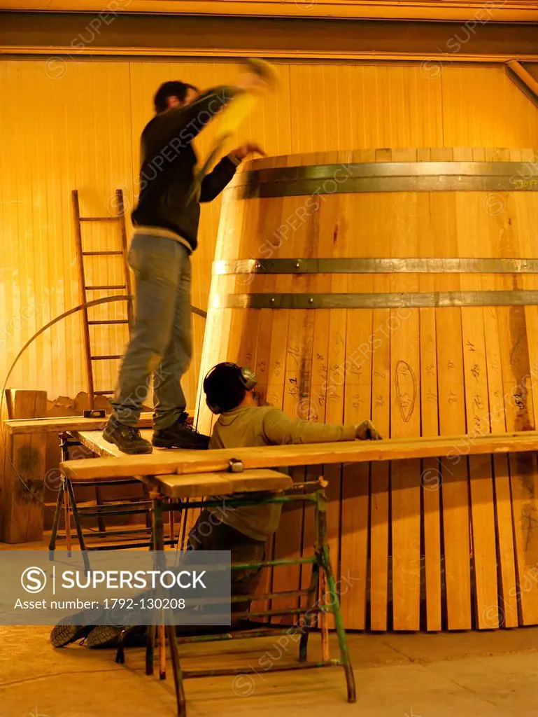 France, Cote d´Or, Beaune, feature: the Cooperage, Tricolored Fire, assembly of a barrel