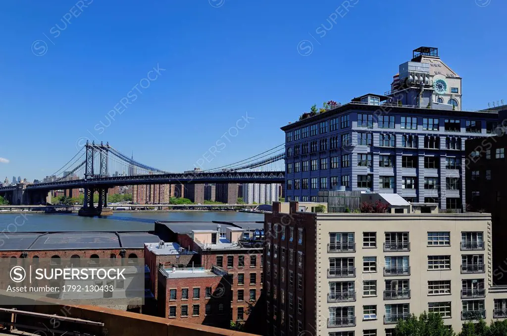 United States, New York City, Brooklyn, Manhattan Bridge and the District under renovation of Dumbo District Under the Manhattan Bridge Over