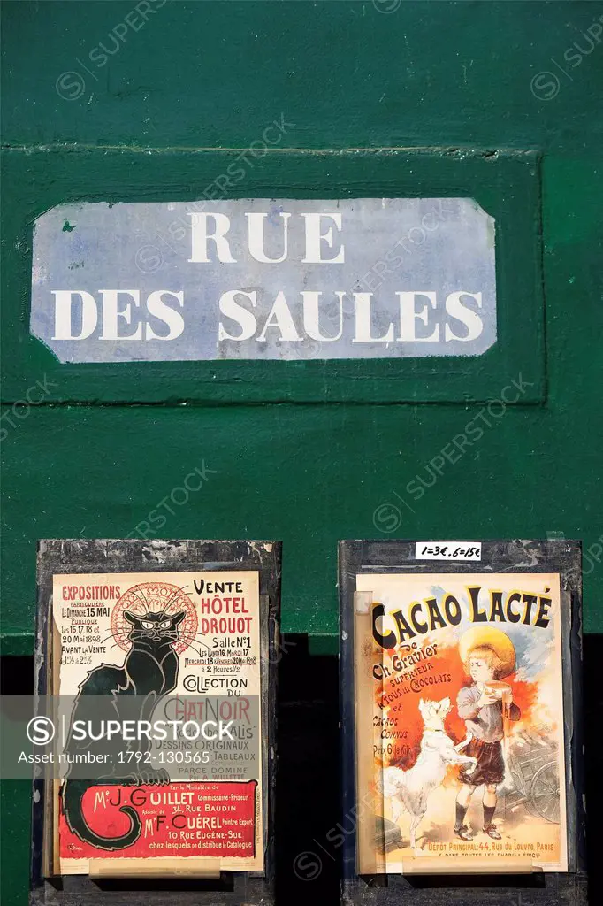 France, Paris, the Butte Montmartre, detail of old posters on Saules street