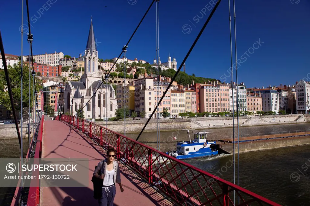 France, Rhone, Lyon, historical site listed as World Heritage by UNESCO, footbridge and St Georges Church over Saone River and Notre Dame de Fourviere...