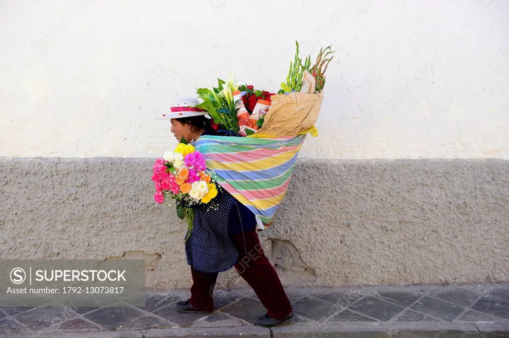 Peru, Cuzco province, Cuzco, listed as World Heritage by UNESCO, flower seller in the San Pedro district