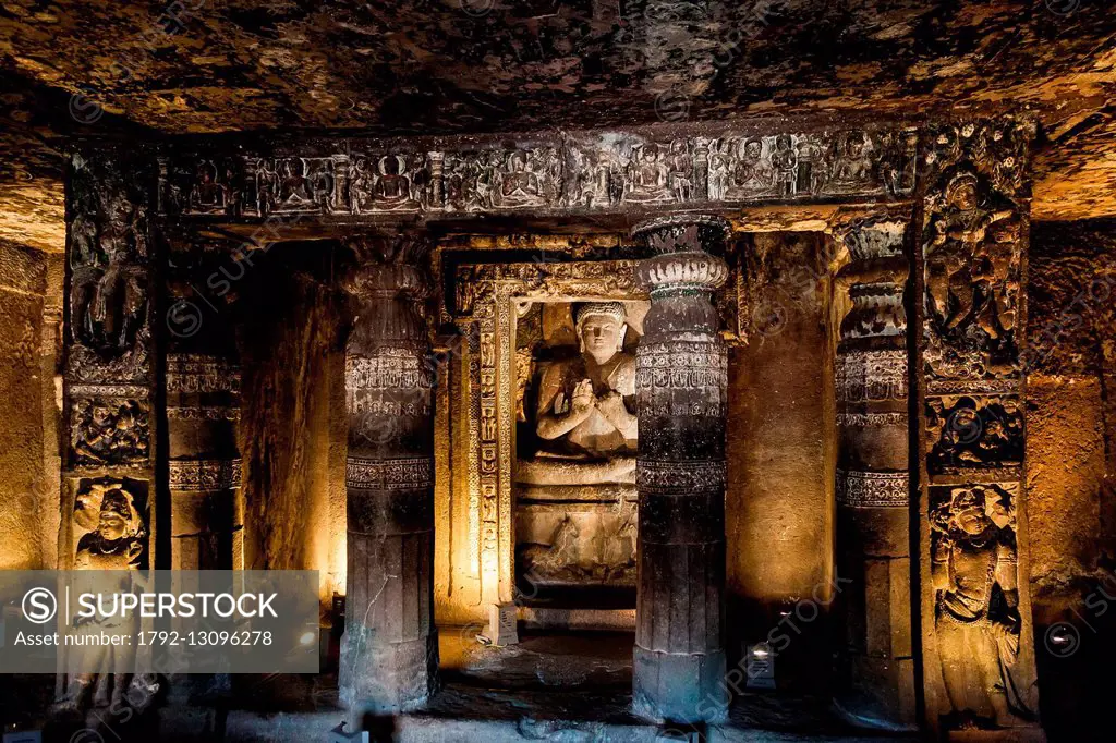India, Maharashtra state, Ajanta, inside a cave, pilars and Bouddha, listed as World Heritage by UNESCO