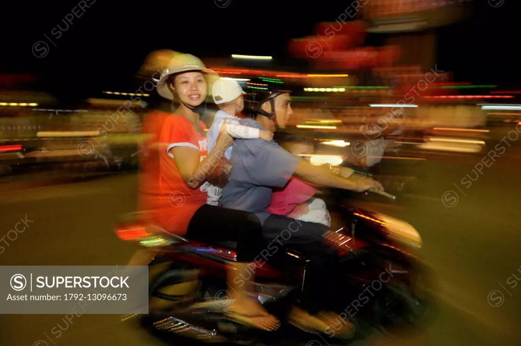 Vietnam, Can Tho province, Mekong delta, Can Tho, people on their bikes on the vietnamese new year eve or Tet