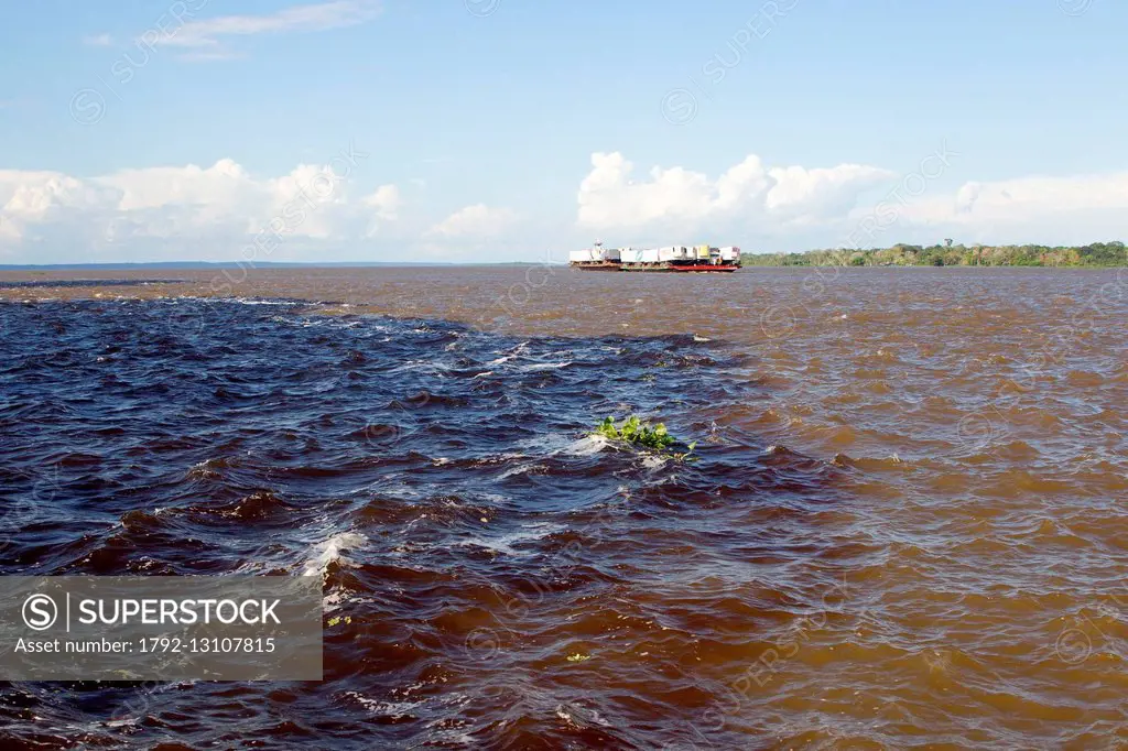 Brazil, Amazonas State, Amazon River, phenomenon of the meeting of waters, the black waters of the Rio Negro meet the white waters of the Rio Solimoes