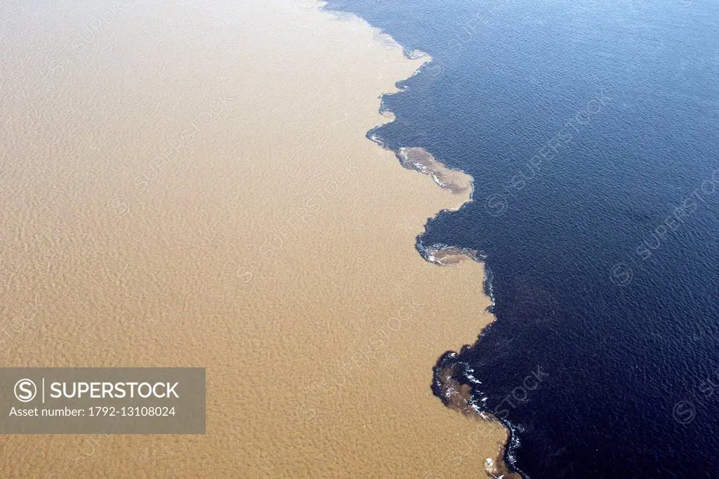 Brazil, Amazonas State, Amazon River, phenomenon of the meeting of waters, the black waters of the Rio Negro meet the white waters of the Rio Solimoes