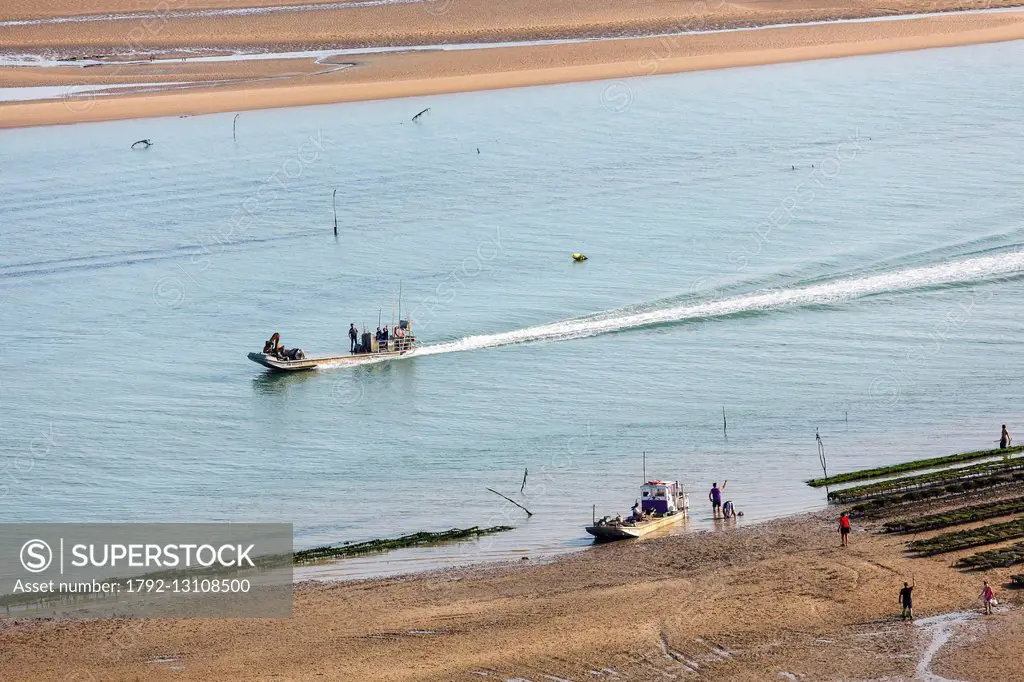 France, Charente Maritime, Ile d'Oleron, Dolus d'Oleron, oyster boat in a channel (aerial view)
