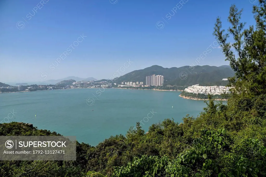 China, Hong Kong, Hong Kong Island, Bay of Tai Tam between stanley's Peninsula and the Peak Aguilar, apartment building in the middle of the vegetatio...