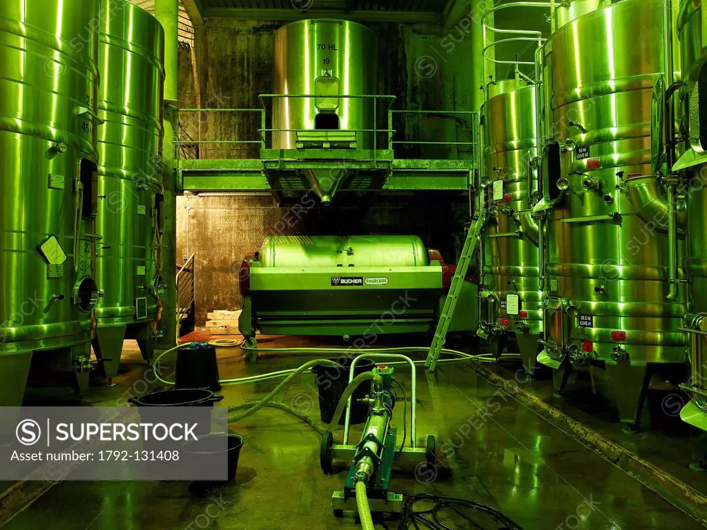 France, feature: Margeon lights the wine, wine vats