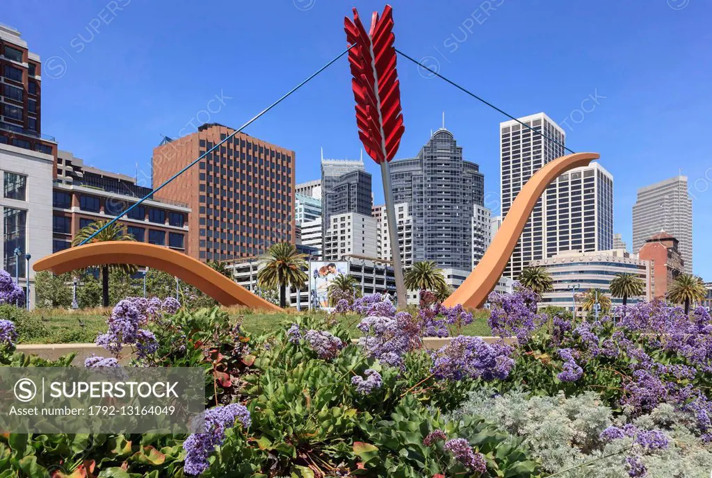 United States, California, San Francisco, Rincon Park, public sculpture Cupid's Span by Claes Oldenburg and Coosje van Bruggen with the San Francisco ...