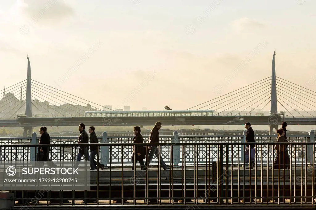 Turkey, Istanbul, Galata bridge, pedestrians crossing the Galata Bridge