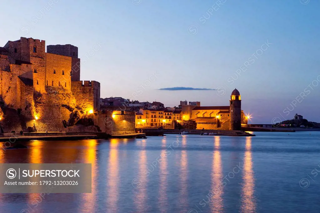 France, Pyrenees Orientales, Cote Vermeille, Collioure at twilight, royal castle and church of Notre Dame des Anges