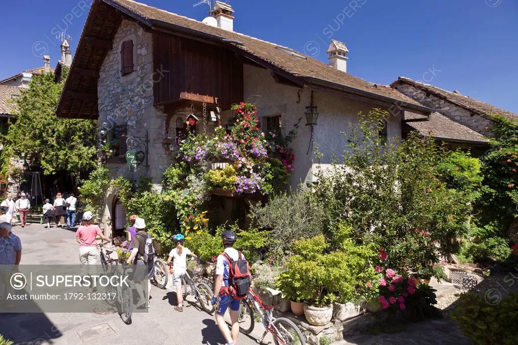 France, Haute Savoie, Le Chablais, Yvoire, labeled Les Plus Beaux Villages de France the Most Beautiful Villages of France, stroll in alleys