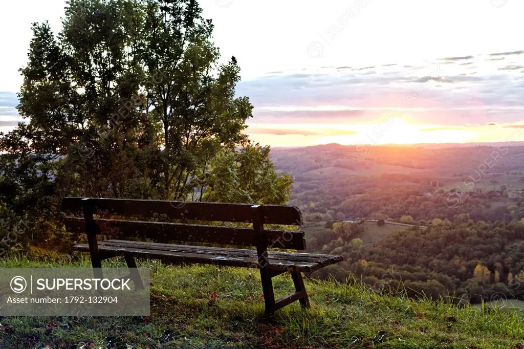 France, Correze, scenic view from Puy d´Yssandon, bench at sunset