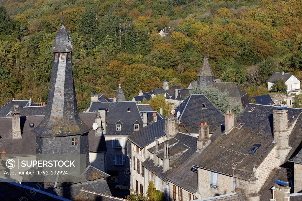France, Correze, Parc Naturel Regional de Millevaches Millevaches Regional Natural Park, Treignac, roofs of the town Notre Dame de la Paix church, a s...