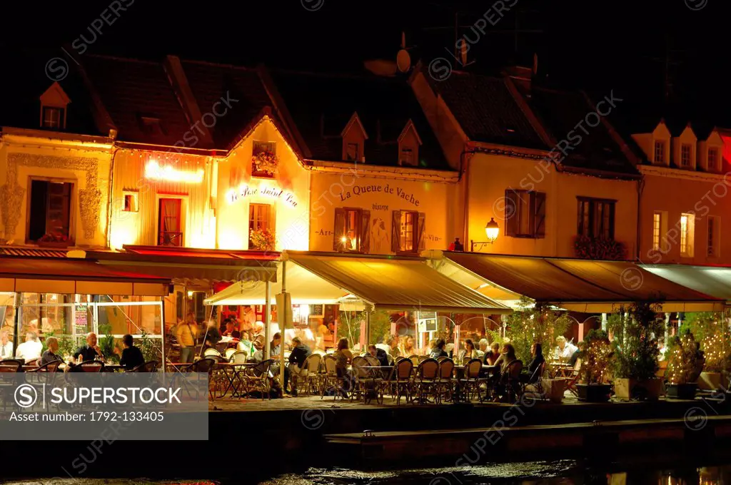 France, Somme, Amiens, St Leu district, cafe and restaurant terraces on Quai Belu by night