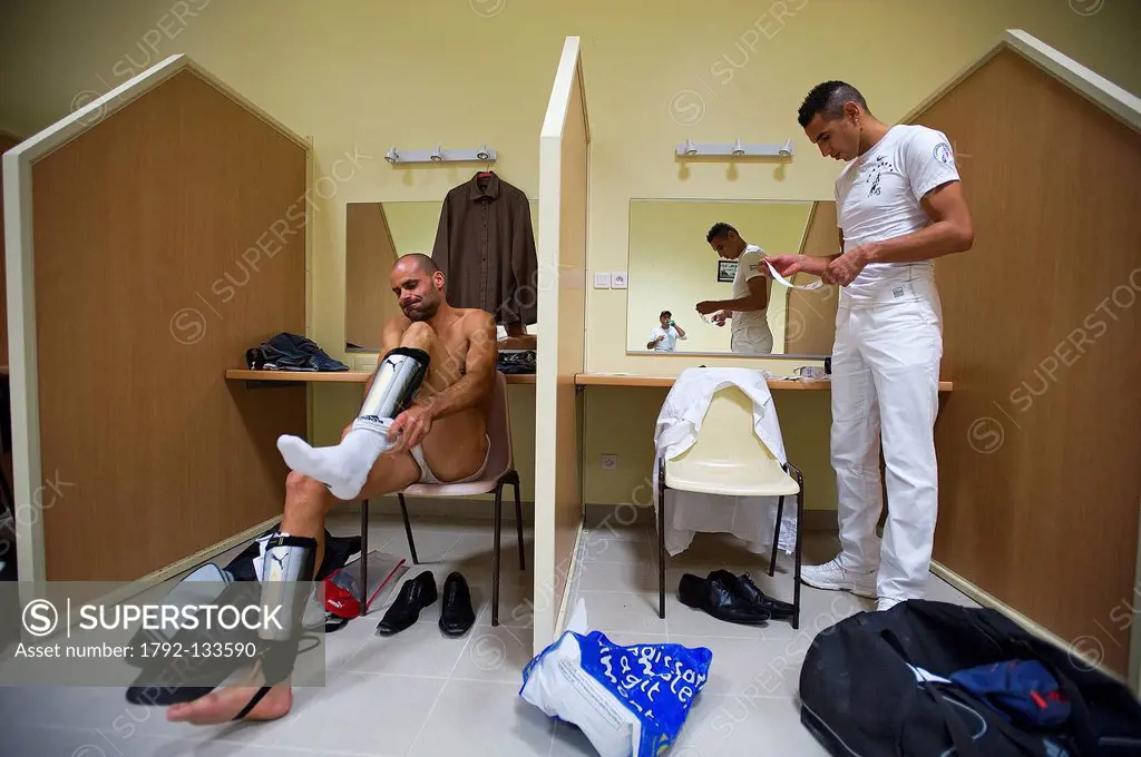 France, Herault, Palavas les Flots, the raseteurs Sabri Allouani in white and Frederic Jockin preparing themselves before the Course camarguaise in th...