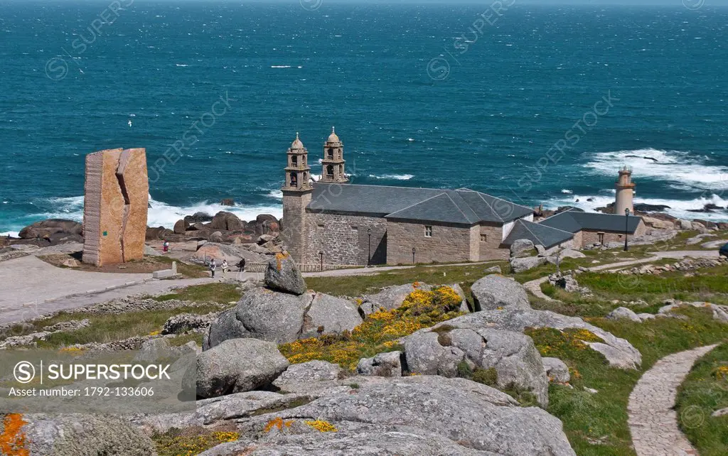 Spain, Galicia, Muxia, Punta da Barca, church and sanctuary Santa Maria da Barca, the Lighthouse, a monument to dedicate to the Prestige disaster