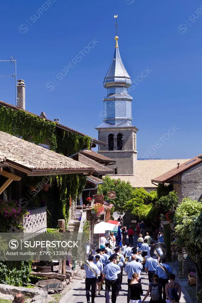 France, Haute Savoie, Le Chablais, Yvoire, labeled Les Plus Beaux Villages de France the Most Beautiful Villages of France, the brass band and the oni...