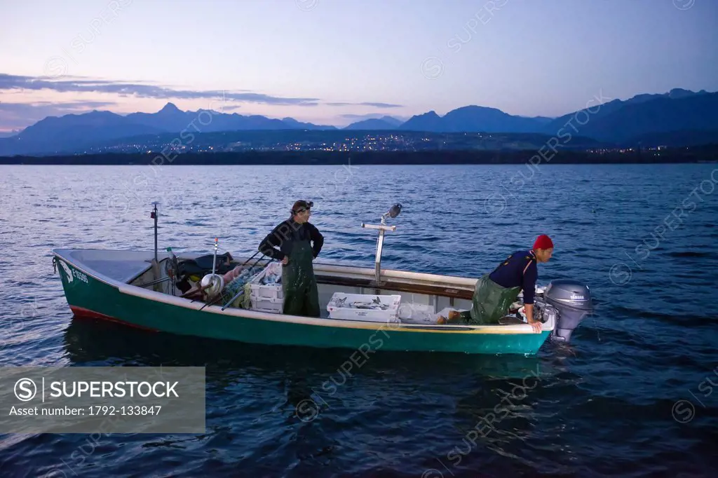 France, Haute Savoie, Le Chablais, Thonon les Bains, fisherman on Lake Geneva