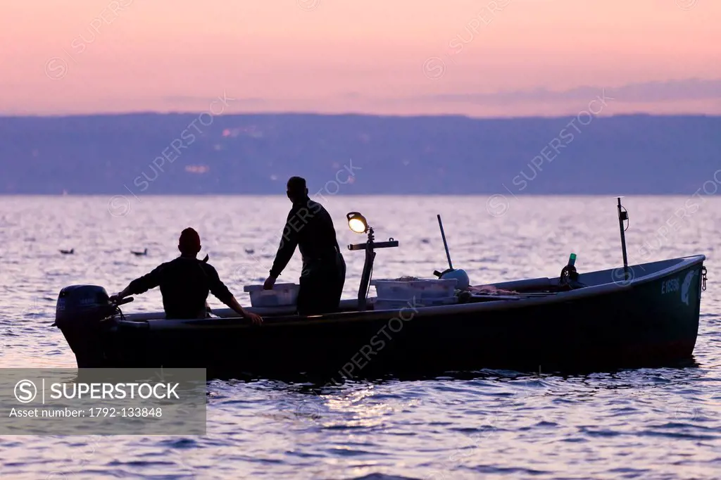 France, Haute Savoie, Le Chablais, Thonon les Bains, fisherman on Lake Geneva