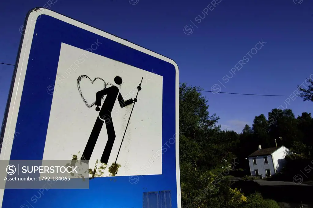 Spain, Galicia, Palas de Rei, road sign warning about the passage of the Santiago pilgrims, retouched with humor and tenderness