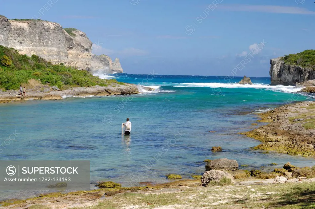France, Guadeloupe French West Indies, Grande Terre, Fisherman in the middle of the Porte d´Enfer Hell´s Gate