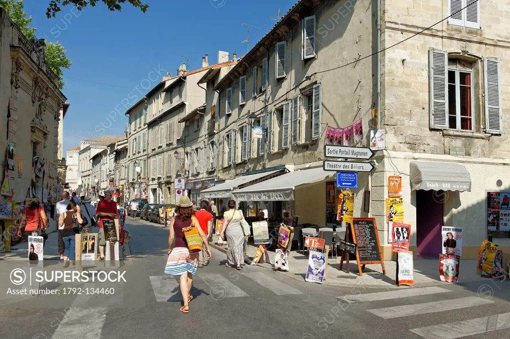 France, Vaucluse, Avignon, Rue des Lices, Avignon Festival, festival goers loitering in the middle of the street