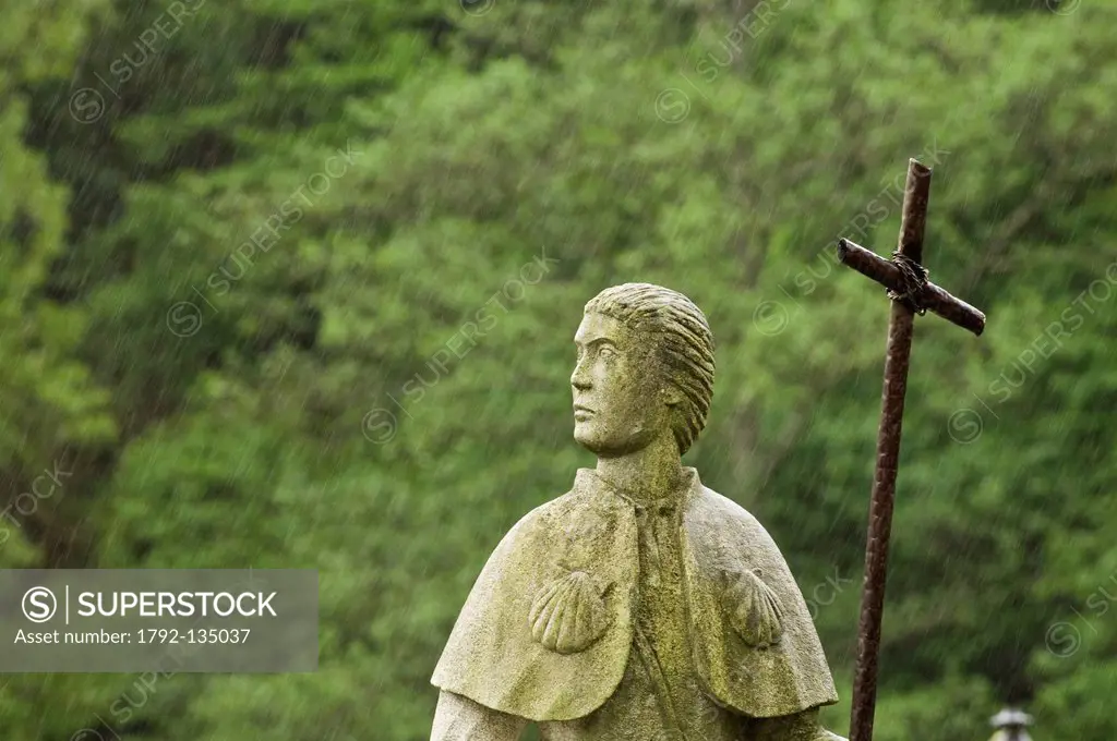 Spain, Galicia, Samos, statues of pilgrims in stone