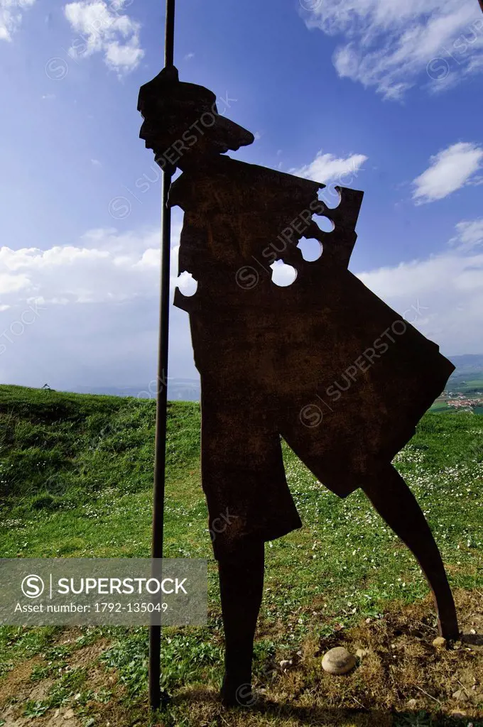 Spain, Navarra, Pamplona, alegoric metal sculpture of the pilgrims, atop Sierra del Perdon