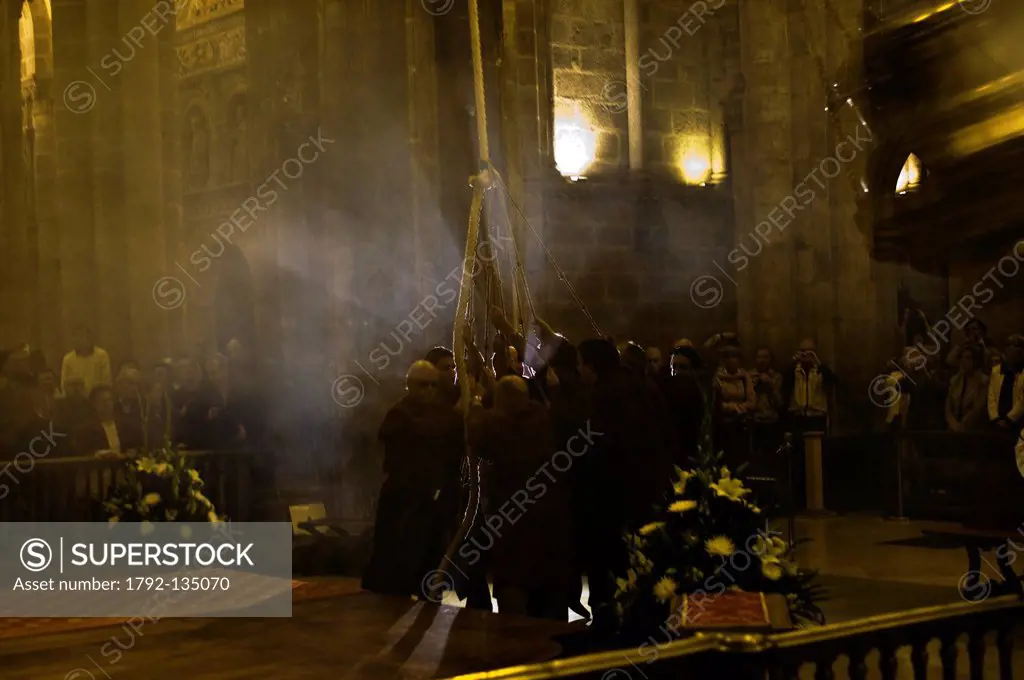 Spain, Galicia, Santiago de Compostela, listed as World Heritage by UNESCO, ceremony of the giant incense burner, or botafumeiro, to purify the cathed...