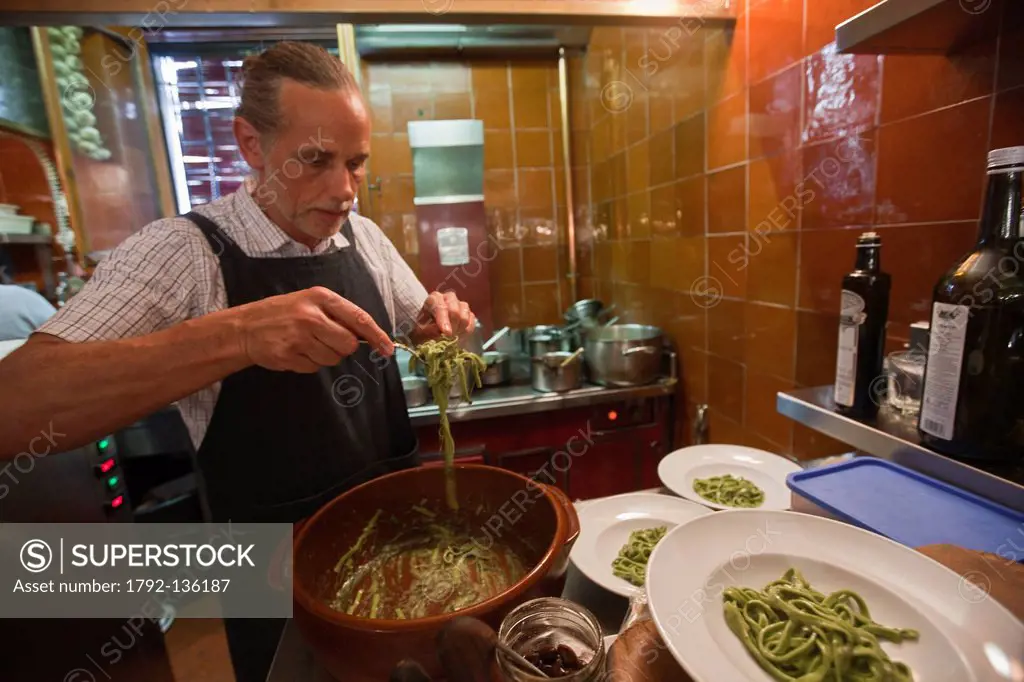 France, Alpes Maritimes, Nice, Dominique Stanc prepares the pesto pasta al dente, restaurant, La Merenda