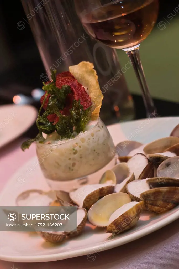 France, Bouches du Rhone, Marseille, Clams sauteed with foam sagebrush and vegetable risotto, recipe Jerome Martens Solaris restaurant, at the Radisso...