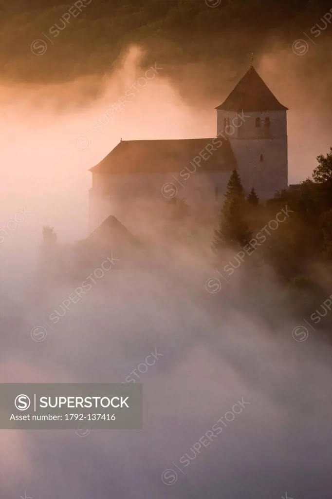 France, Lot, Saint Cirq Lapopie, the village at dawn and its fortified church, labeled The Most Beautiful Villages of France