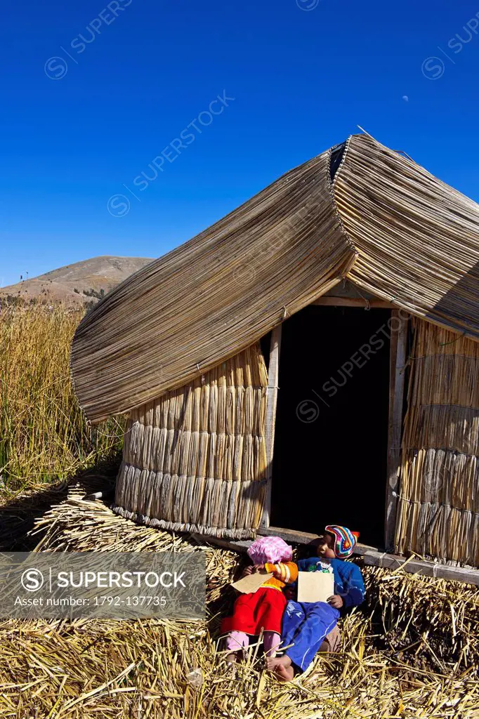 Peru, Puno province, Titicaca lake, floating islands of Uros, lying on a bed of reeds, 80 cm high above the surface of water, the artificial archipela...