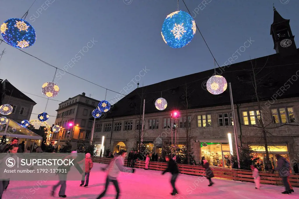 France, Doubs, Montbeliard, Place des Halles, outdoor skating rink, illuminations, during the Christmas market in December