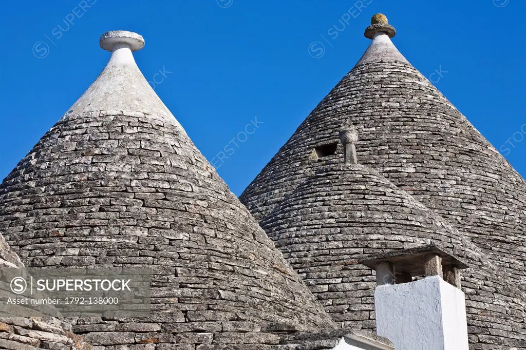 Italy, Puglia, Bari province, Alberobello, trulli borrough old dry stone buildings with slate roof, listed as Wolrd Heritage by UNESCO