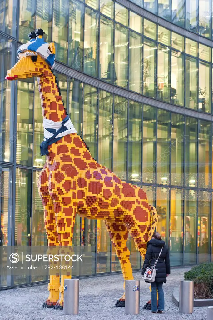 Germany, Berlin, Mitte, Postdamer Platz, Sony Center, built by Helmut Jahn between 1996 and 2000, a Lego giraffe at the entrance to Legoland Discovery...