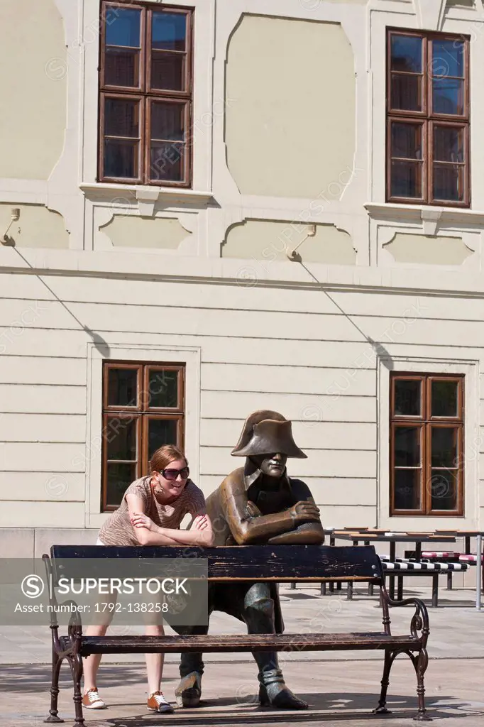 Slovakia, Bratislava, Historic center, main square, statue by sculptor Juraj Melis representing a Napoleonic soldier in front of the Kutscherfeld pala...