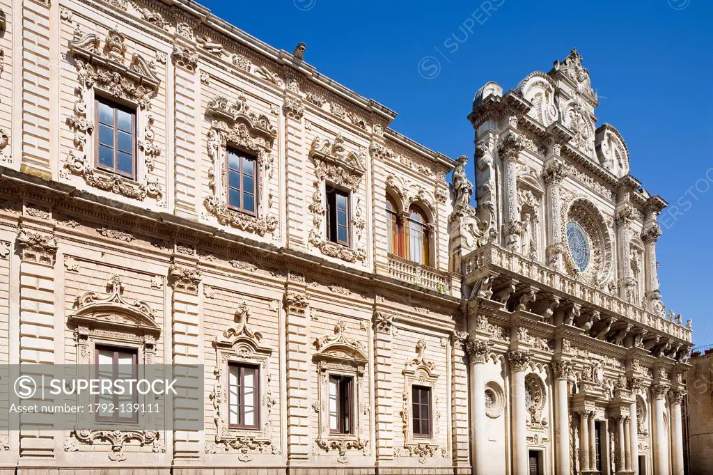 Italy, Puglia, Lecce, Palazzo del Governo in old Celestine convent from 17th century with Santa Croce basilica 16th adn 17th century in the background
