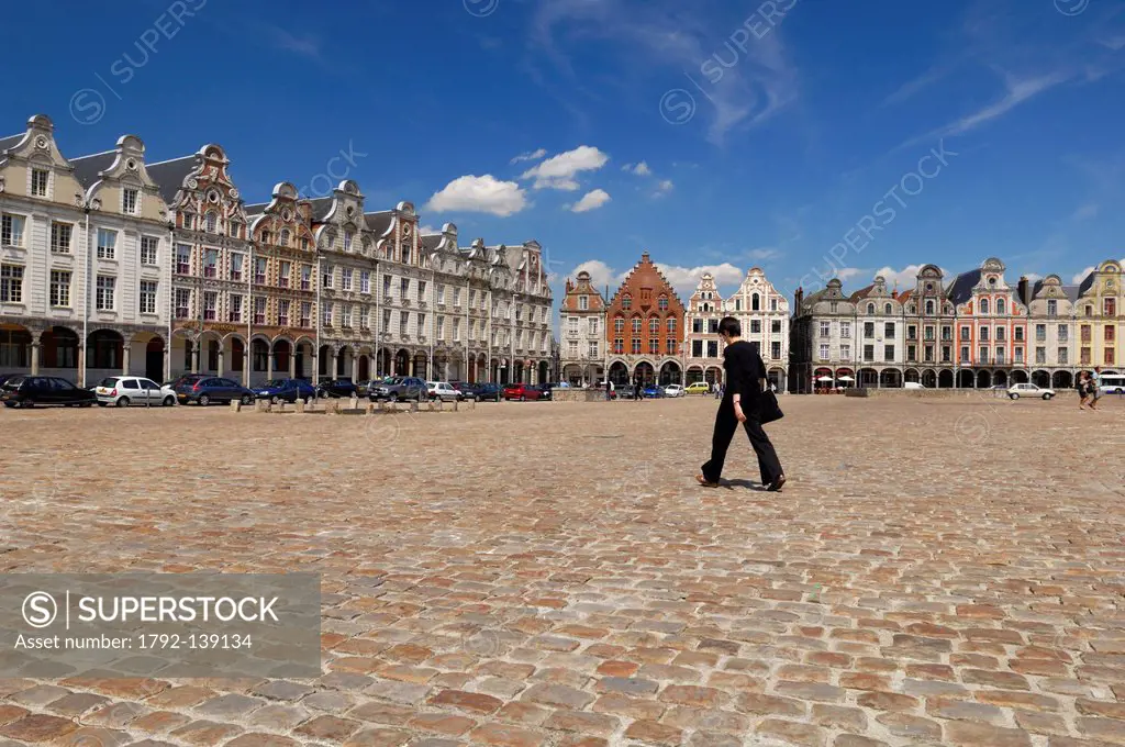France, Pas de Calais, Arras, Grand Place, walkers cobblestones of the Grand Place Square and typical houses