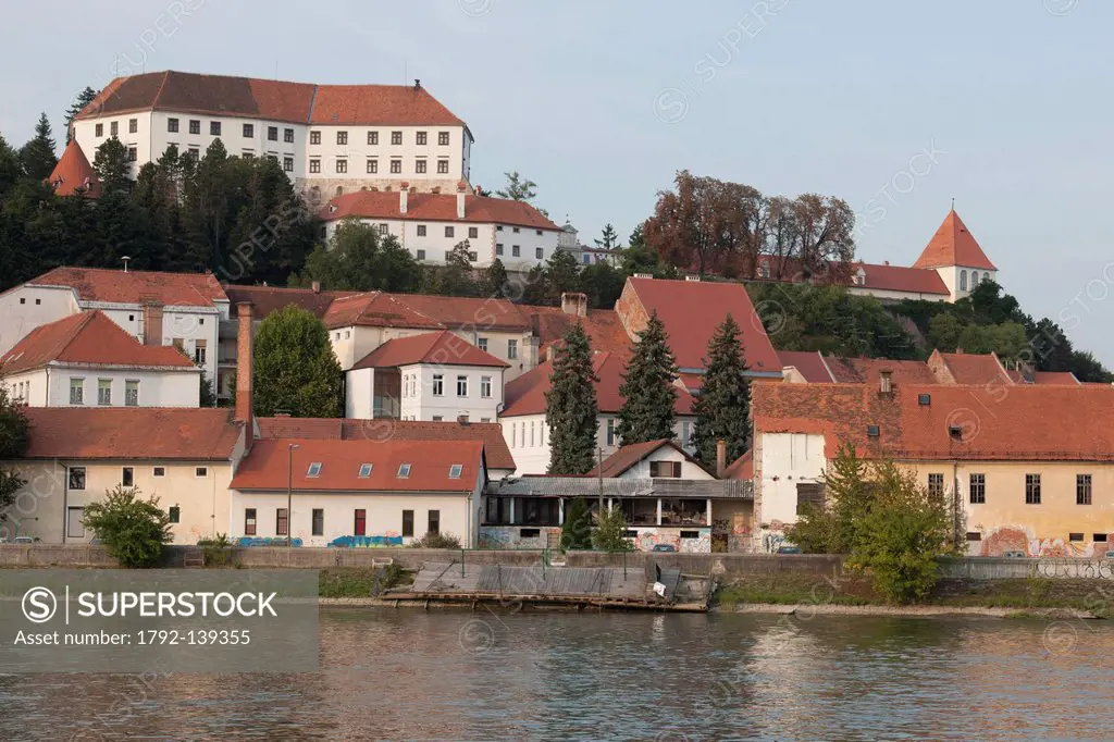Slovenia, Lower Styria Region, Ptuj, town on the Drava River banks, the castle seen from the river