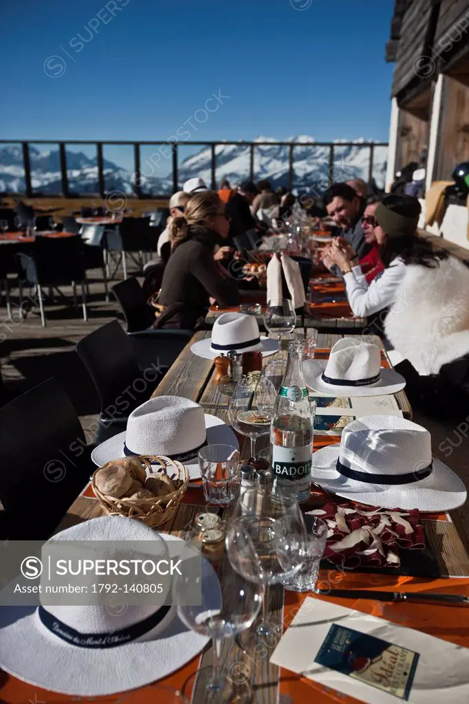 France, Haute Savoie, Megeve, the Chalet Terrace altitude, 1850 The Ideal restaurant at the top of Mont d´Arbois, hats on the tables on the terrace fa...