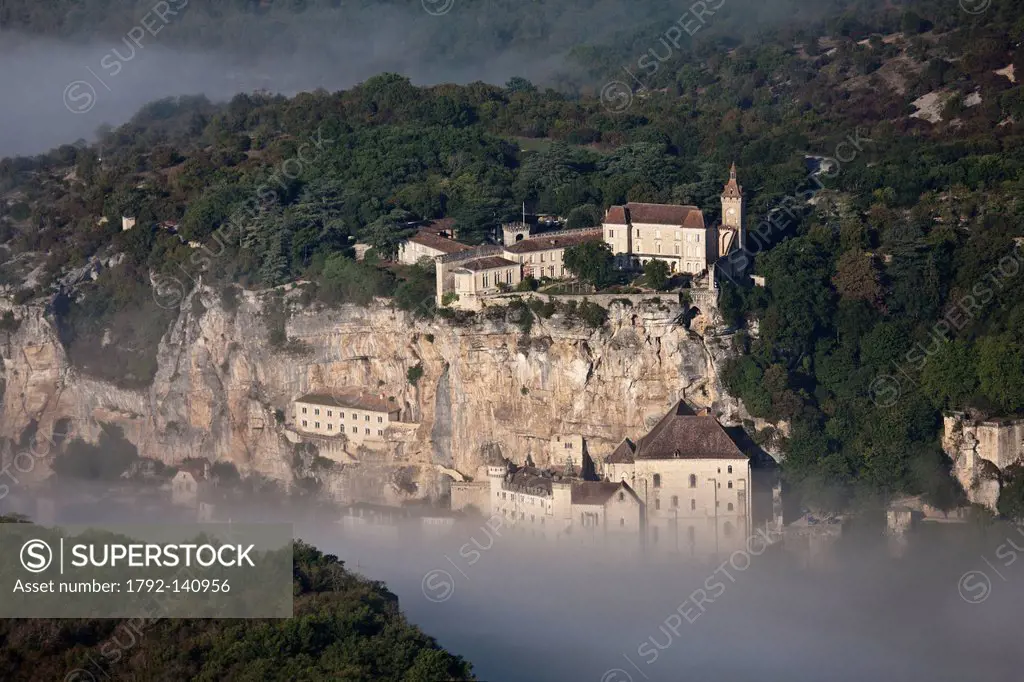 France, Lot, Rocamadour, Aerial view of the city and its religious shrines dominated by its castle in the Canyon of the Alzou
